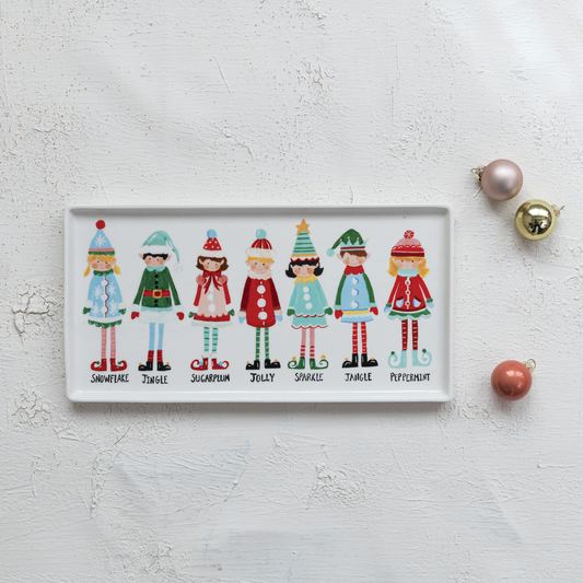 Mellow Monkey rectangular stoneware platter featuring a colorful illustration of seven festive Santa's elves.