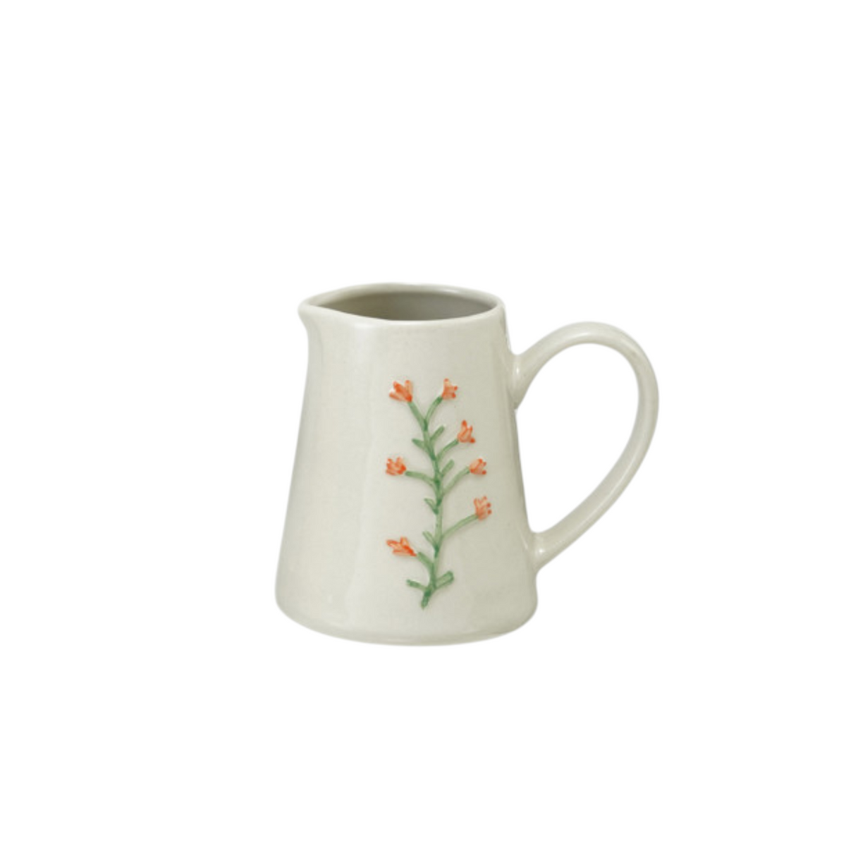 Mellow Monkey stoneware creamer in cream with embossed orange botanical flower motif and reactive glaze finish.