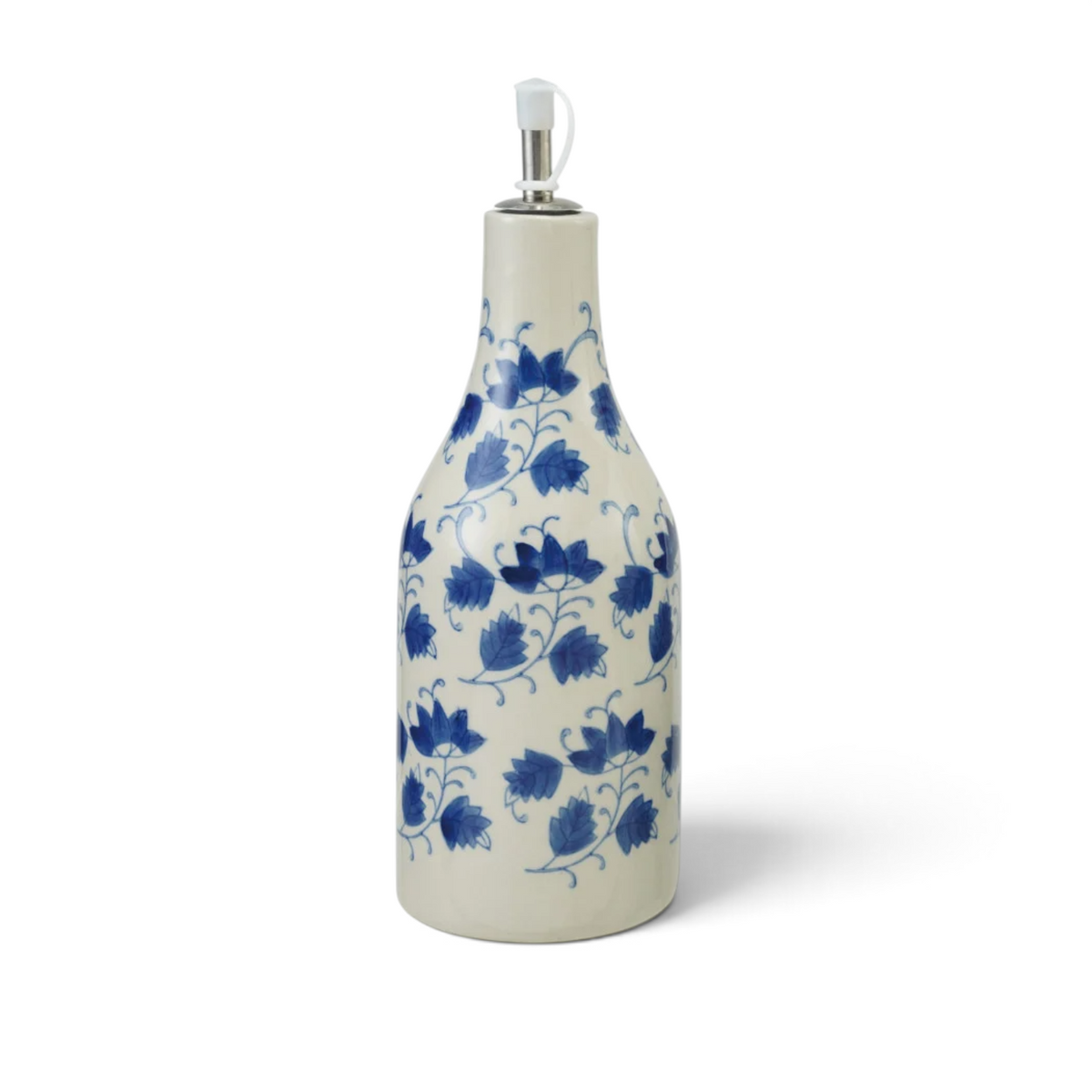 Mellow Monkey stoneware oil cruet featuring a blue and white floral pattern with a stainless steel spout.