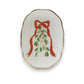 Mellow Monkey white stoneware scalloped dish featuring a festive mistletoe and red ribbon design with gold trim.
