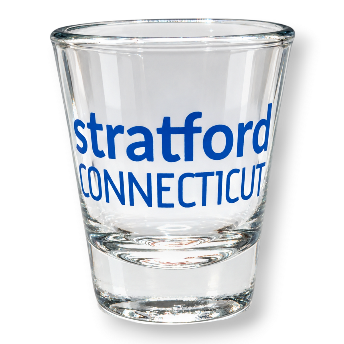 Mellow Monkey clear glass shot glass featuring blue Stratford Connecticut text, perfect for a souvenir or bar display.
