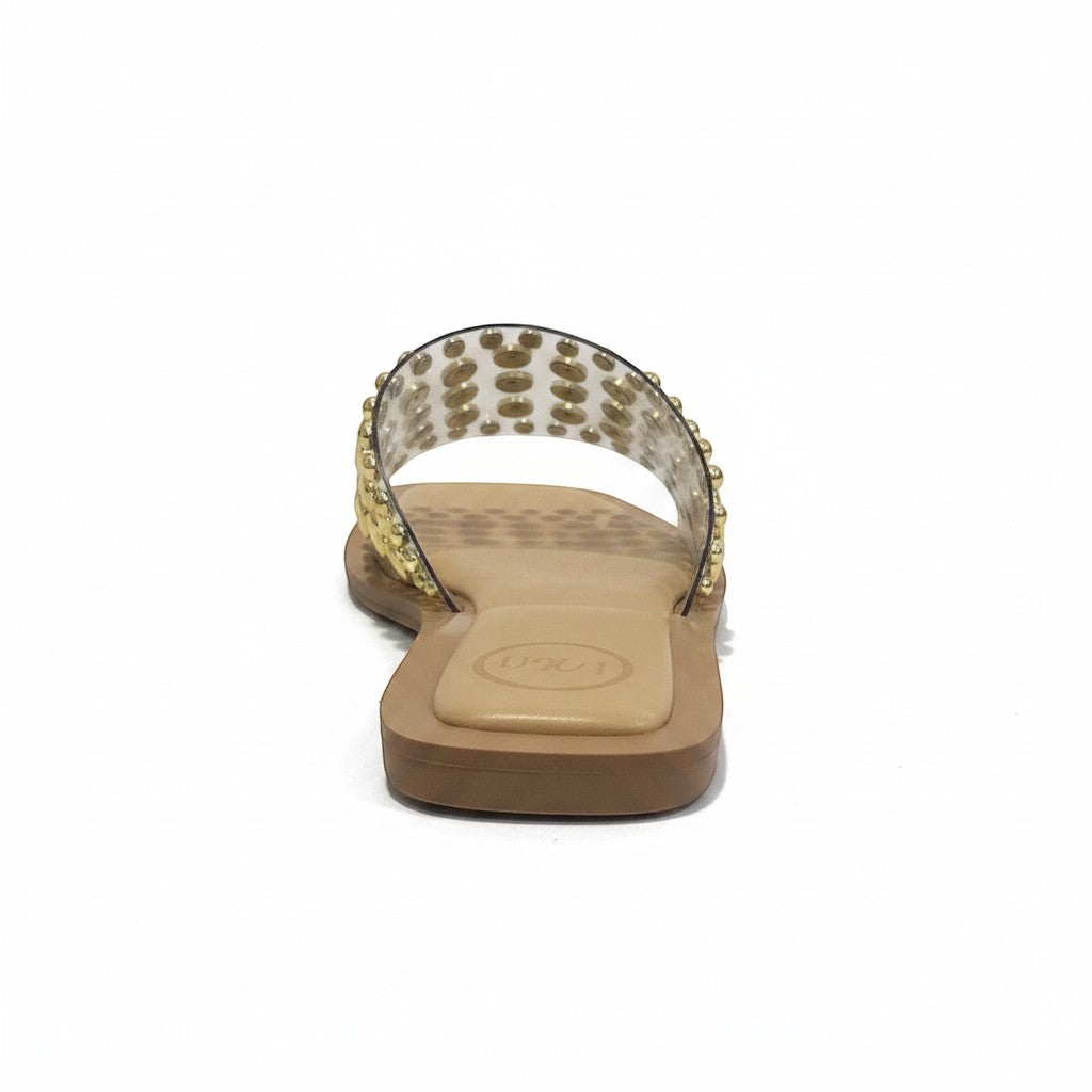 Mellow Monkey studded clear strap slide sandals with gold studs and a tan footbed.