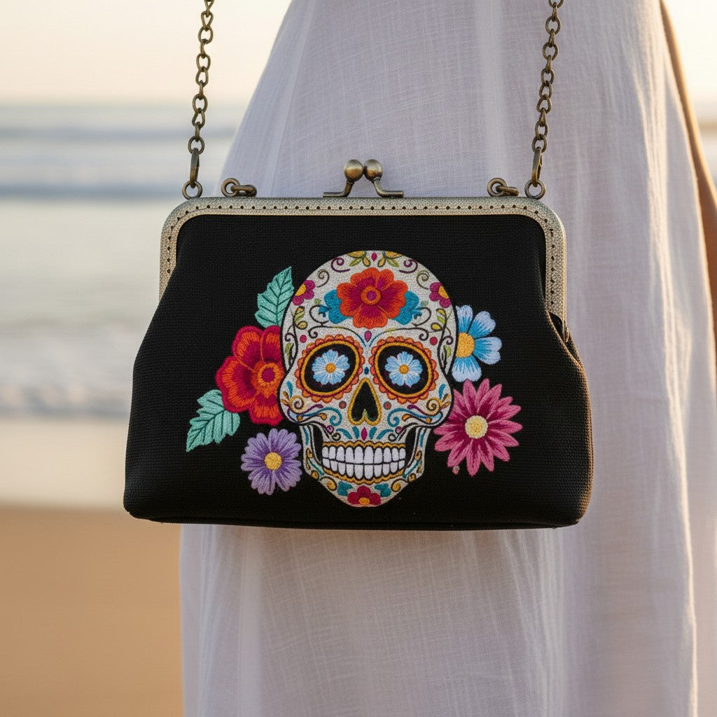 Mellow Monkey sugar skull kiss lock bag in black linen cotton blend with colorful floral embroidery and chain strap