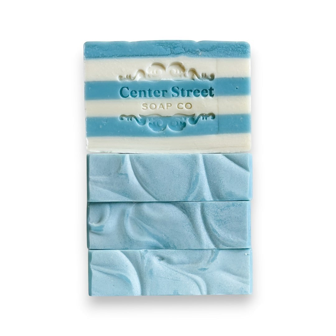 Mellow Monkey Summer Cottage handmade soap bar, blue and white striped top, swirled blue bottom bars. 4-oz.