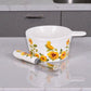 Mellow Monkey ceramic sunflower dip bowl with matching spreader knife, 10-oz capacity, microwave and oven safe.