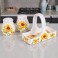 Mellow Monkey Temp-tations stoneware salt and pepper shakers with a matching sunflower-patterned handled basket.