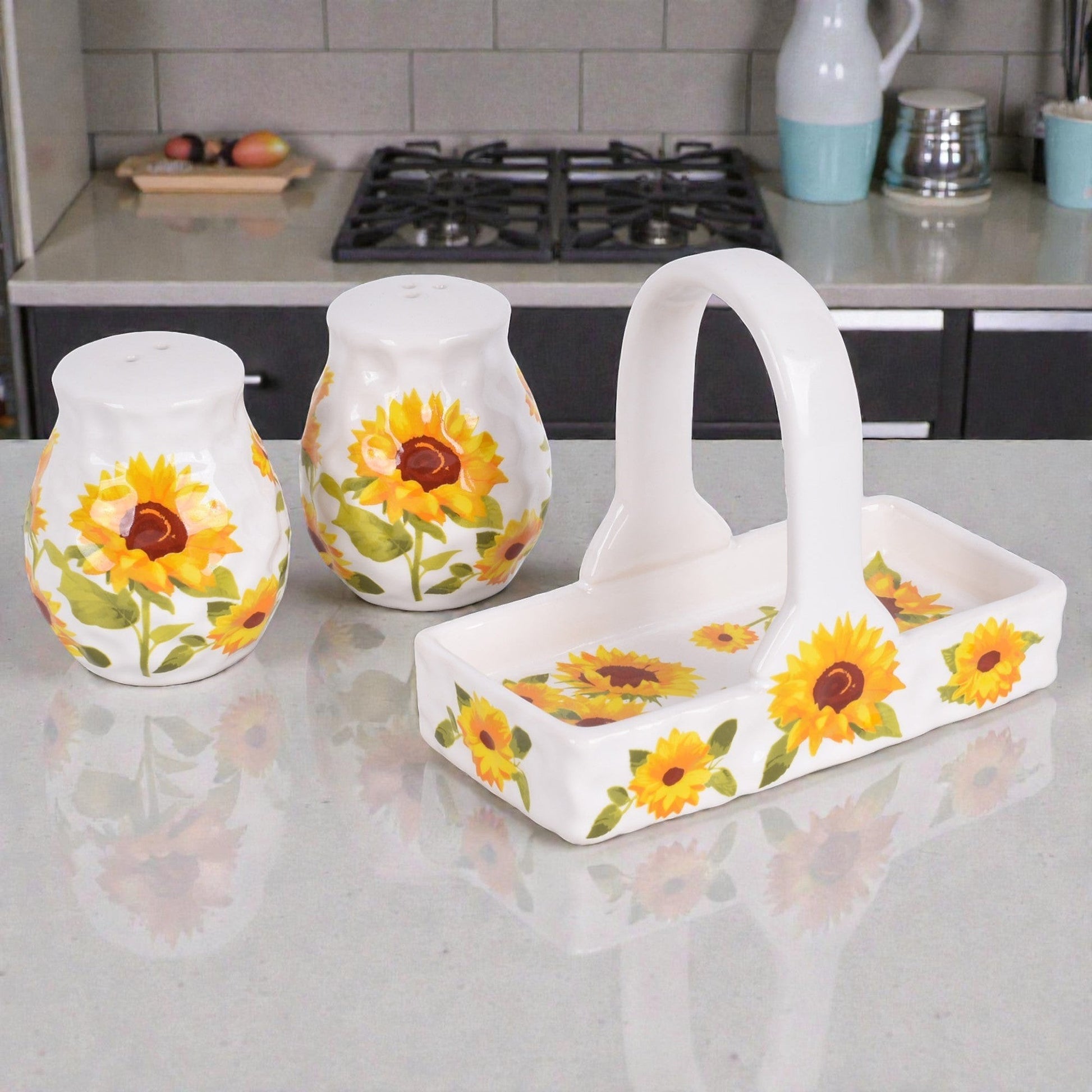 Mellow Monkey Temp-tations stoneware salt and pepper shakers with a matching sunflower-patterned handled basket.
