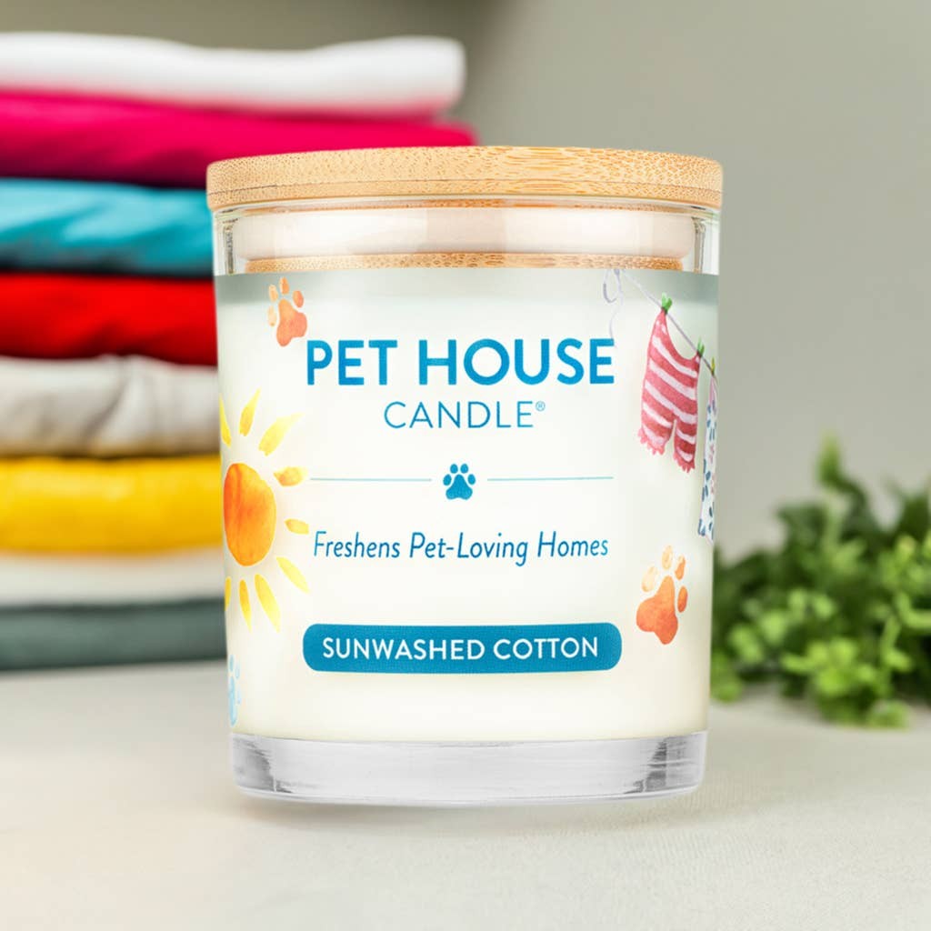 Mellow Monkey Pet House candle in Sunwashed Cotton scent with a bamboo lid, featuring a clean laundry fragrance.