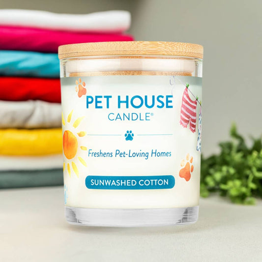 Mellow Monkey Pet House candle in Sunwashed Cotton scent with a bamboo lid, featuring a clean laundry fragrance.