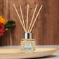 Mellow Monkey Pet House reed diffuser in Sunwashed Cotton scent with paw print label on a decorative tray
