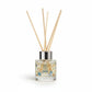 Mellow Monkey Sunwashed Cotton reed diffuser in a glass bottle with paw print design for neutralizing pet odors.