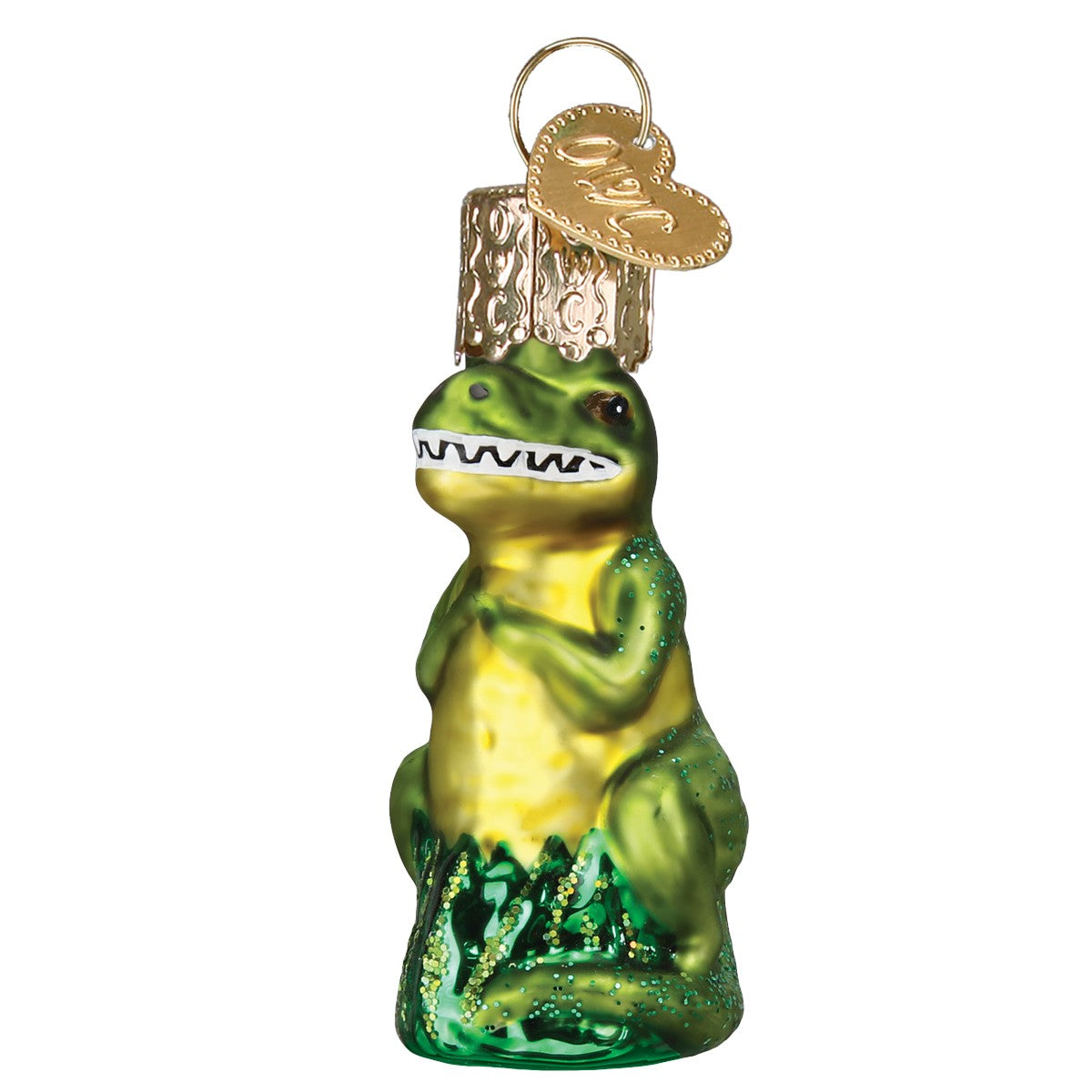 Mellow Monkey Mini T-Rex blown glass holiday ornament, green and yellow with glitter accents. Features a gold heart charm.