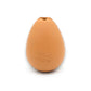 Mellow Monkey tan egg-shaped rubber treat-dispensing dog toy with a small opening for kibble on a white background