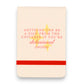 Mellow Monkey tan leatherette pocket journal with red embossed text and elastic closure strap.