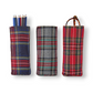 Mellow Monkey tartan plaid triangular weighted eyeglass holders in red, grey, and blue patterns on a white background.