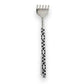 Mellow Monkey telescoping back scratcher with a black and white polka dot pattern and a metal rake head.