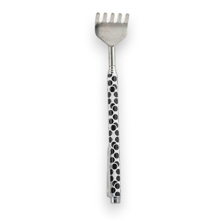Mellow Monkey telescoping back scratcher with a black and white polka dot pattern and a metal rake head.