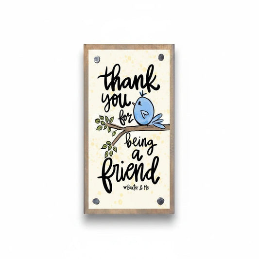 Mellow Monkey Thank You For Being A Friend driftwood block sign with a blue bird illustration on a branch.