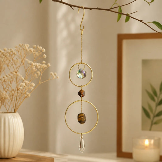 Mellow Monkey Tiger's Eye healing suncatcher with bronze rings, crystals, and a hanging hook for window decor.