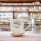 Mellow Monkey handmade ceramic mug with speckled finish and Simply The Best Tina Turner quote in blue text