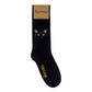 Mellow Monkey Tinker black cat socks featuring a white cat outline with yellow eyes on a soft black cotton blend