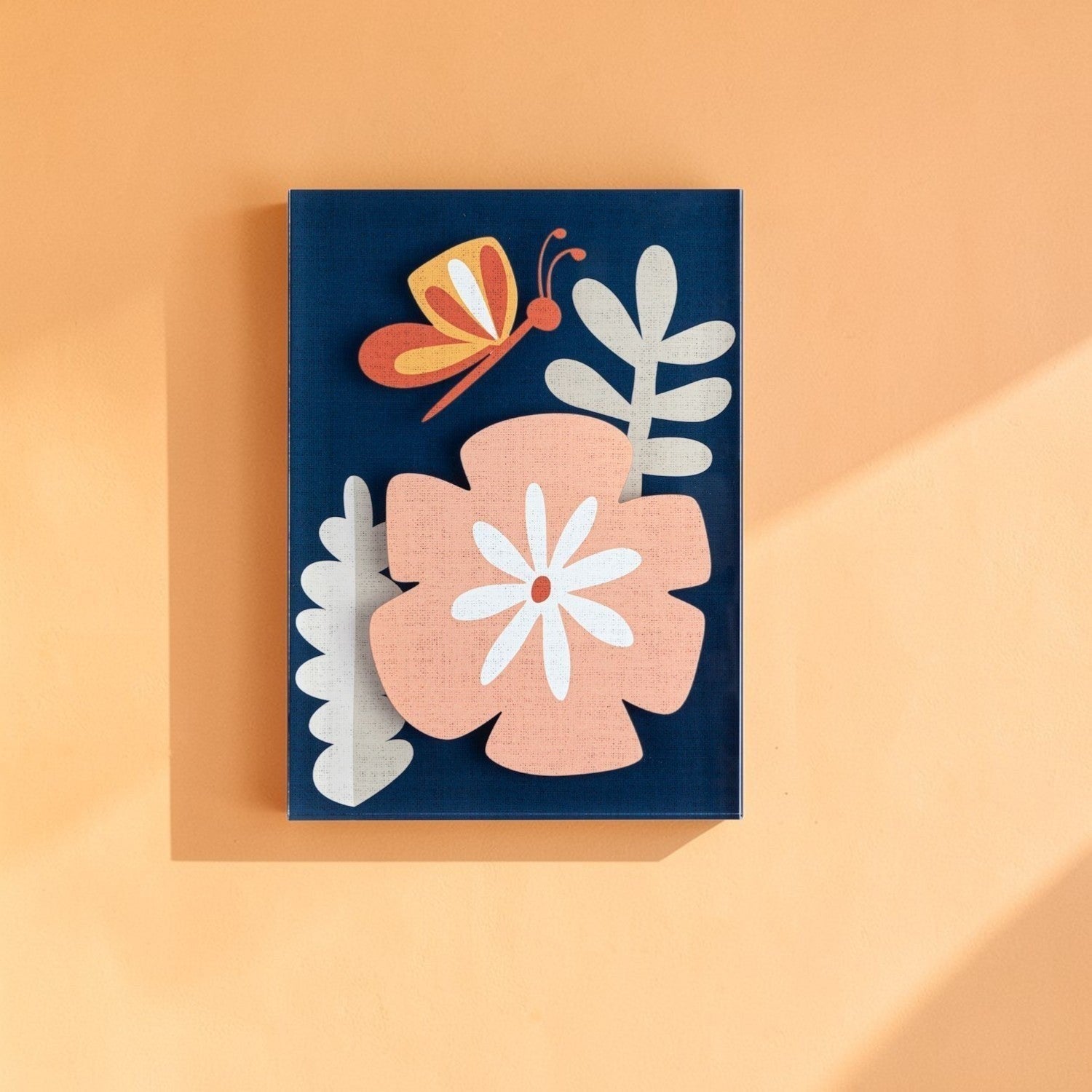 Mellow Monkey Together Tile Acrylic Wall Art, 5x7-in, featuring a pink flower, white leaves, and an orange butterfly on a navy blue background.