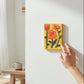 Mellow Monkey Together Tile Acrylic Wall Art, 5x7-in, featuring orange and red abstract flowers on a yellow textured background.