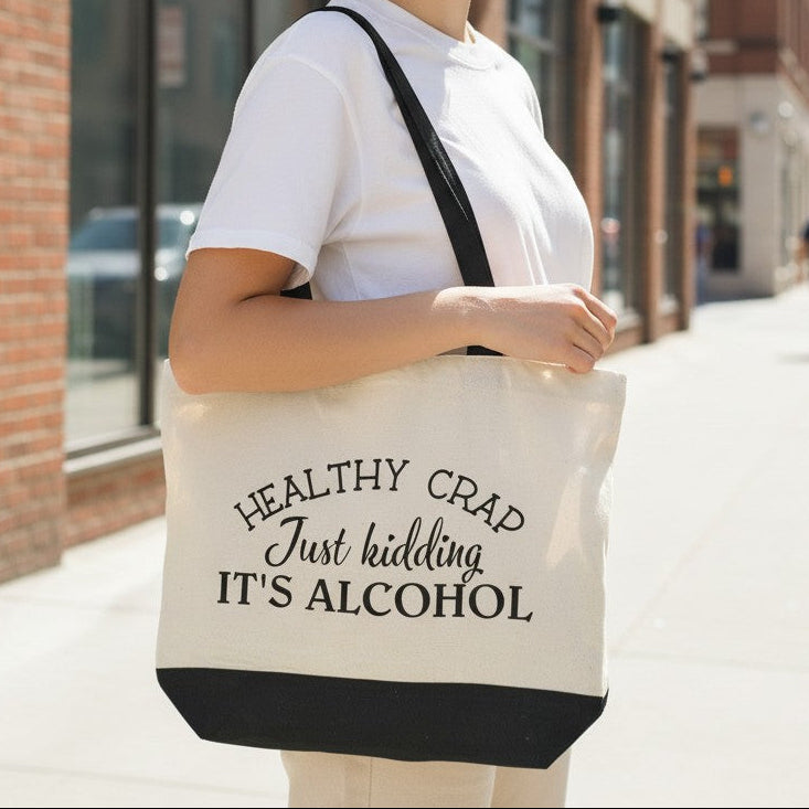 Mellow Monkey natural cotton tote bag with black handles and base, featuring