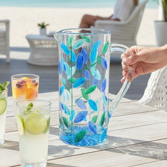 Mellow Monkey Tree of Life Venetian glass pitcher in aqua blue and green hand-painted leaf design. 47 oz capacity.