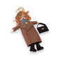 Mellow Monkey fashion doll keychain with trench coat, scarf, boots, and handbag. Camel brown coat.