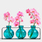 Mellow Monkey Trivo triple aqua recycled glass vases in a black metal stand with pink orchid stems