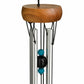Mellow Monkey mini healing chime with a wooden canopy, aluminum tubes, and turquoise and black stone accents.