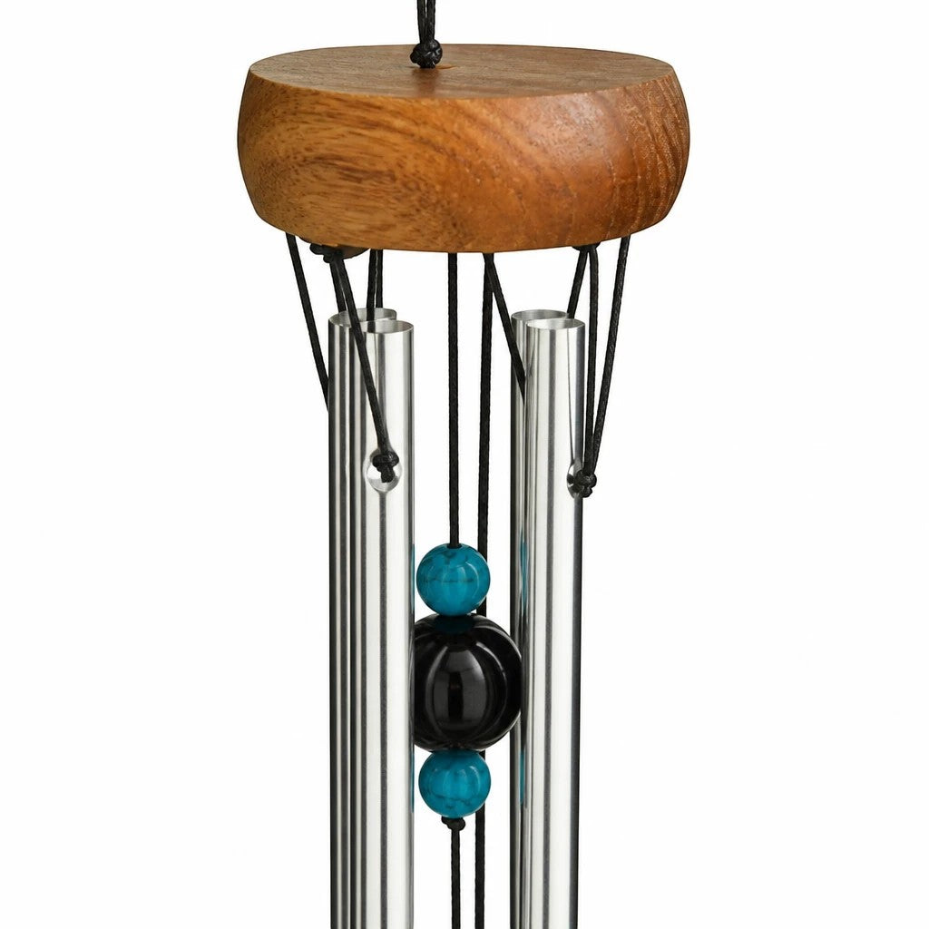 Mellow Monkey mini healing chime with a wooden canopy, aluminum tubes, and turquoise and black stone accents.