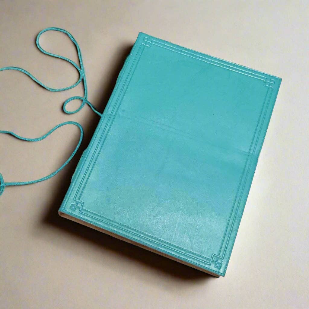 Mellow Monkey turquoise leather journal with debossed corners and elastic closure, unlined pages, 8x6 inches.