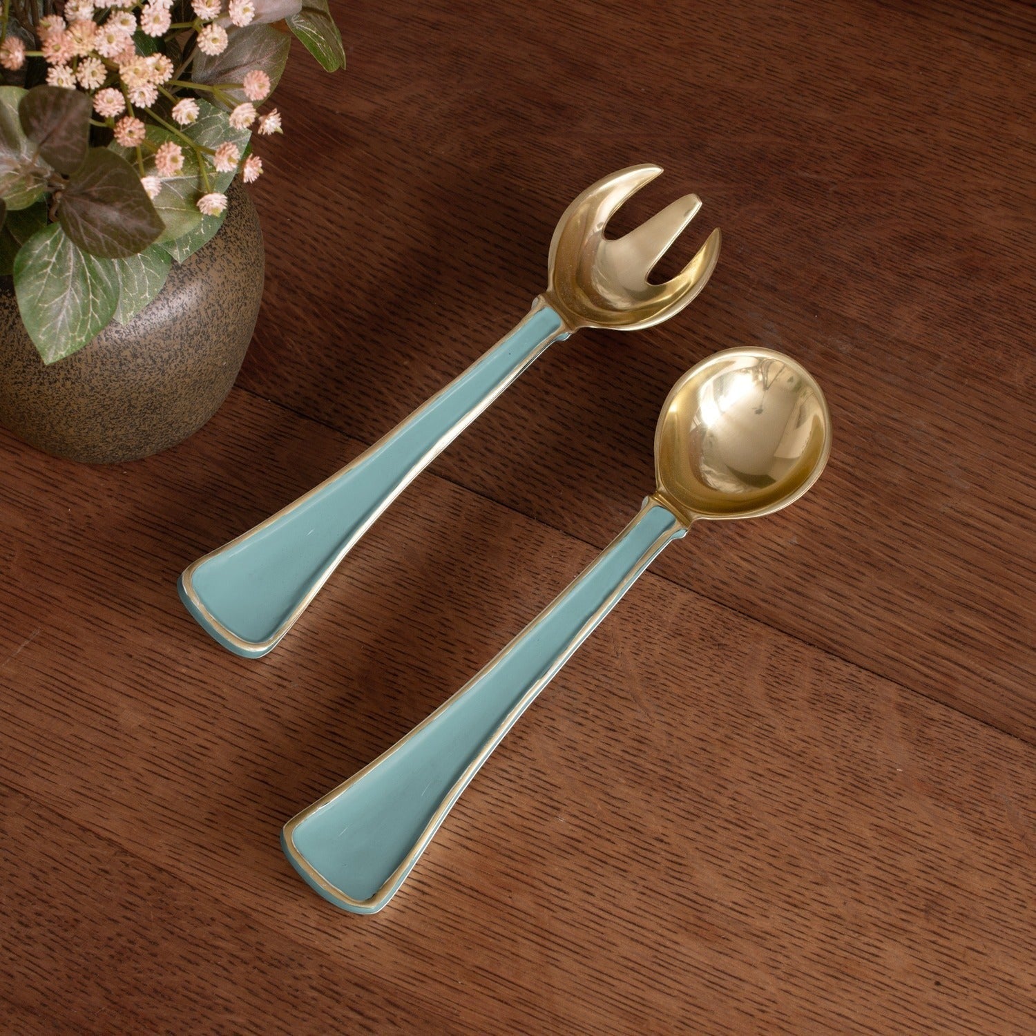 Mellow Monkey ENCANTO Soho salad servers in turquoise with gold trim. Set includes a fork and spoon, made of aluminum alloy with enamel finish.