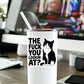 Mellow Monkey vinyl sticker on a white tumbler featuring an unimpressed tuxedo cat with bold text on a desk.