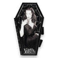 Mellow Monkey Vampira coffin-shaped compact mirror featuring a glittery cobweb design and iconic horror imagery.