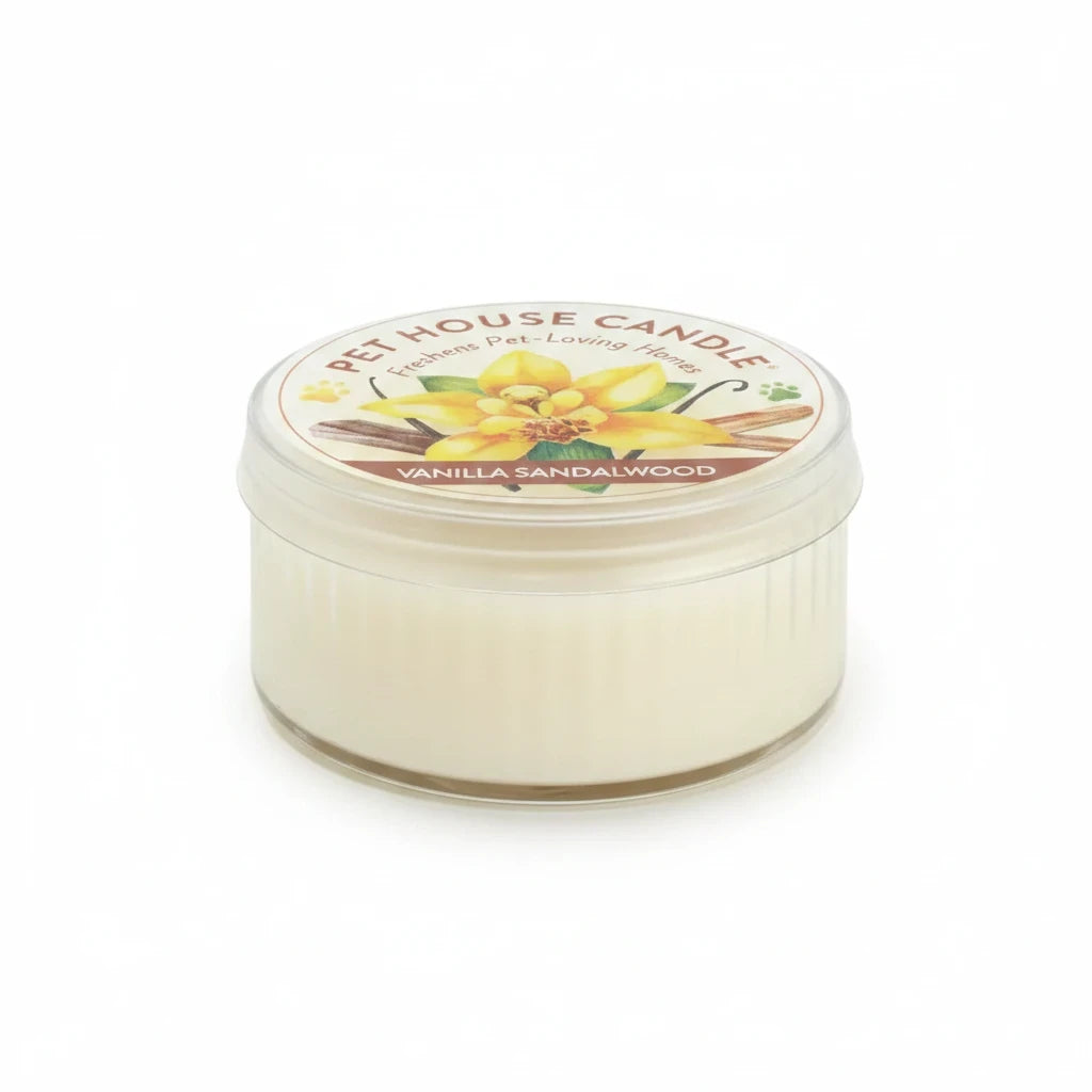 Mellow Monkey Pet House mini candle in Vanilla Sandalwood scent, a 1.5-oz odor-neutralizing candle in a clear jar.