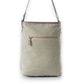 Mellow Monkey Vespertine shoulder bag in olive canvas and brown leather with a zippered exterior pocket