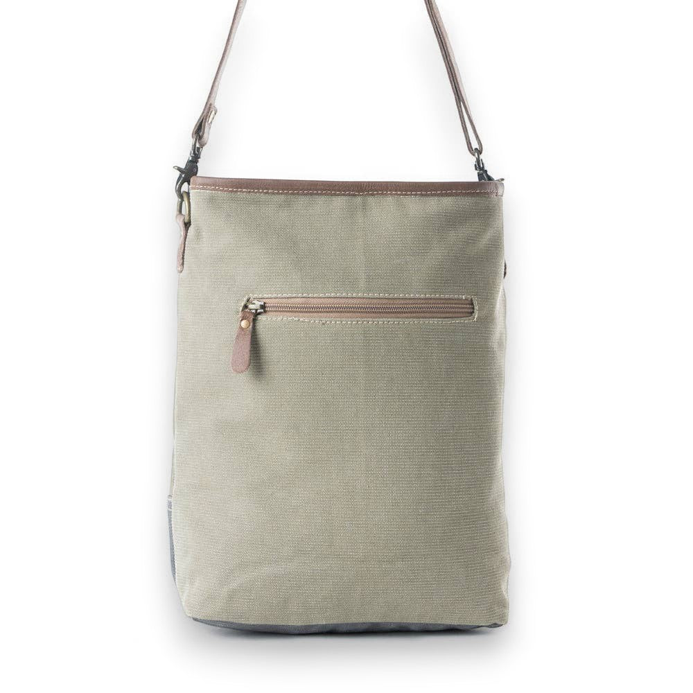 Mellow Monkey Vespertine shoulder bag in olive canvas and brown leather with a zippered exterior pocket