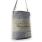 Mellow Monkey Vespertine shoulder bag in grey and olive canvas with brown leather trim and vintage typography print.