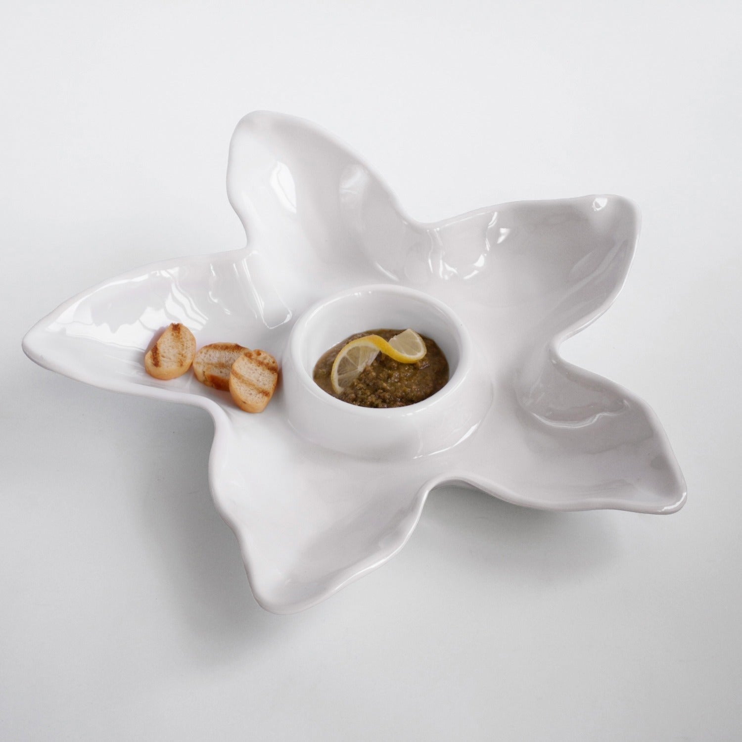 Mellow Monkey VIDA Ocean Starfish Chip and Dip in white ceramic. Features a central bowl for dip and wide sections for chips.