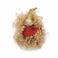 Mellow Monkey vintage-style fabric elf ornament with a gold hat, red outfit, and posable limbs in shredded paper