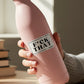 Mellow Monkey F*ck That vinyl sticker applied to a matte pink reusable water bottle held in a hand