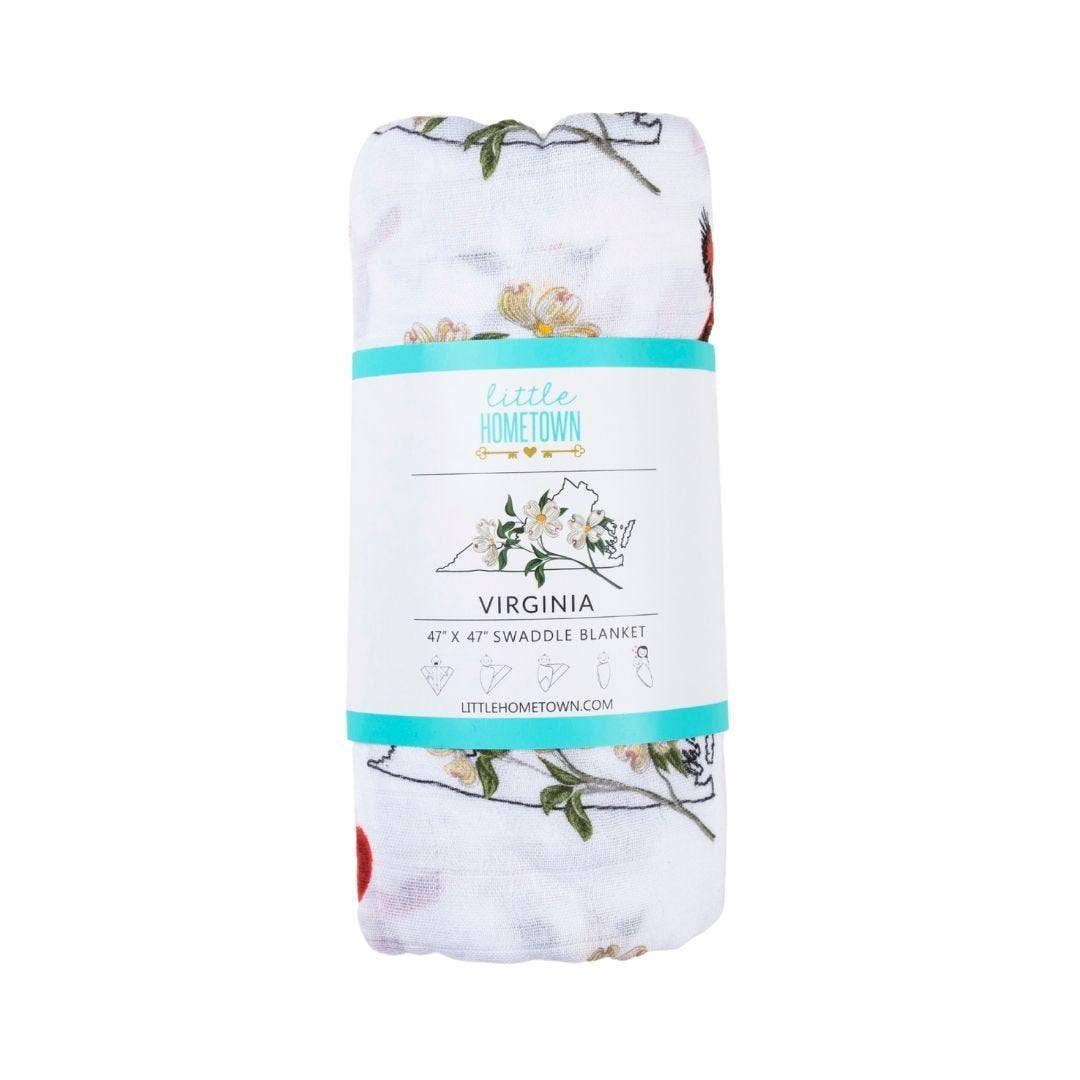 Mellow Monkey Virginia floral muslin bamboo cotton swaddle blanket with a white background and botanical print.