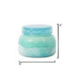 Mellow Monkey Volcano Artisan Signature candle in a turquoise sea glass finish jar with the lid on. Candle dimensions.