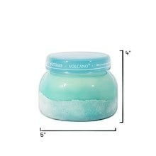 Mellow Monkey Volcano Artisan Signature candle in a turquoise sea glass finish jar with the lid on. Candle dimensions.