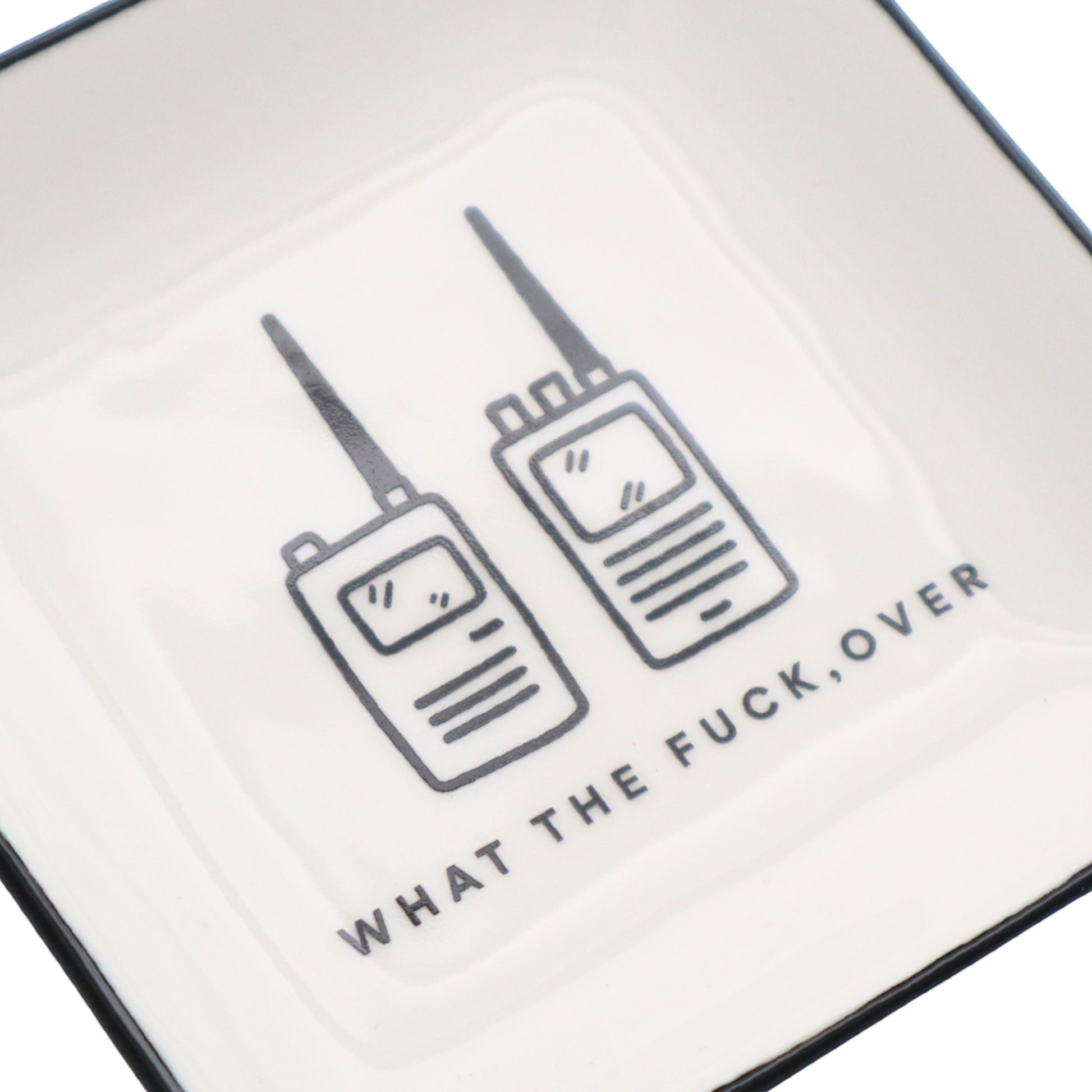 Mellow Monkey square ceramic trinket tray featuring two walkie-talkies and the text What The Fuck, Over.