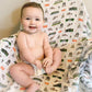 Mellow Monkey Washington DC print muslin swaddle blanket with a smiling baby sitting on it