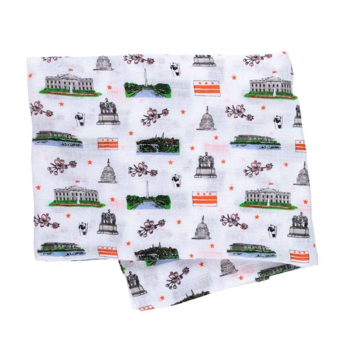 Mellow Monkey Washington DC print muslin swaddle blanket featuring monuments, cherry blossoms, and pandas.